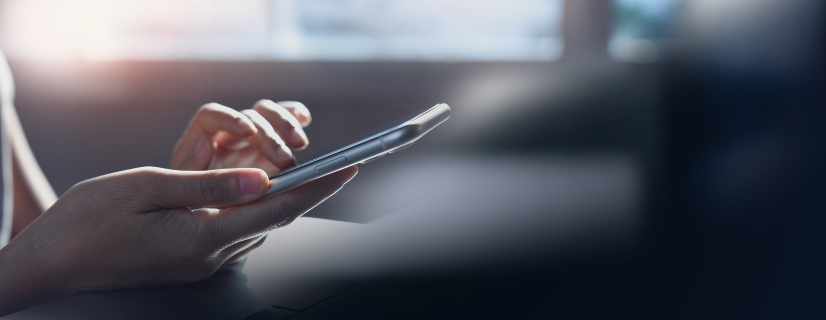 Closeup, woman hand using mobile smartphone, surfing the internet, web browsing via mobile app, social media, network, side view, internet technology, online marketing