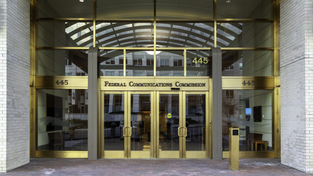 Entrance to Federal Communications Commission in Washington, D.C., USA. FCC is an independent agency of the USA government that regulates communications.