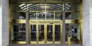 Entrance to Federal Communications Commission in Washington, D.C., USA. FCC is an independent agency of the USA government that regulates communications.