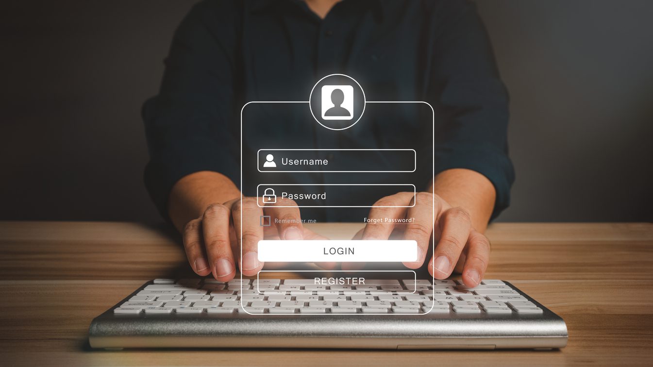 Businessman using notebook to type user and passwords for login financial applications, identification information security, and encryption, Concept of Cyber security for internet access