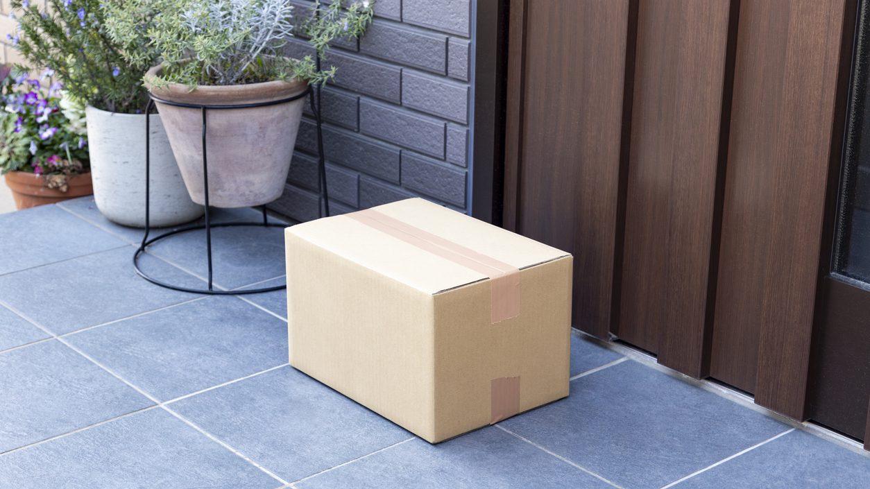 A cardboard box placed at the entrance.